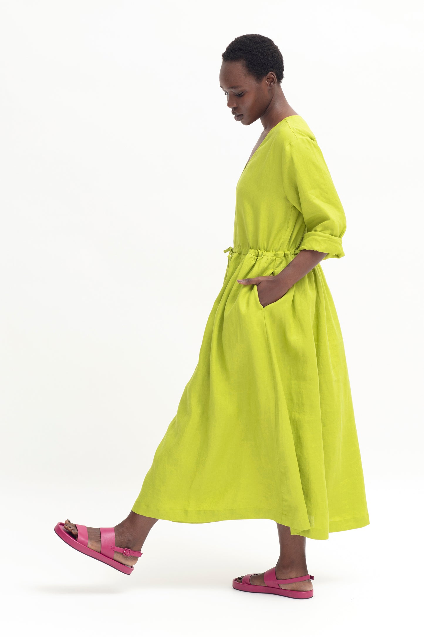 Blossa French Linen Long Sleeve V-neck Long Dress Model Walking Side | LIME