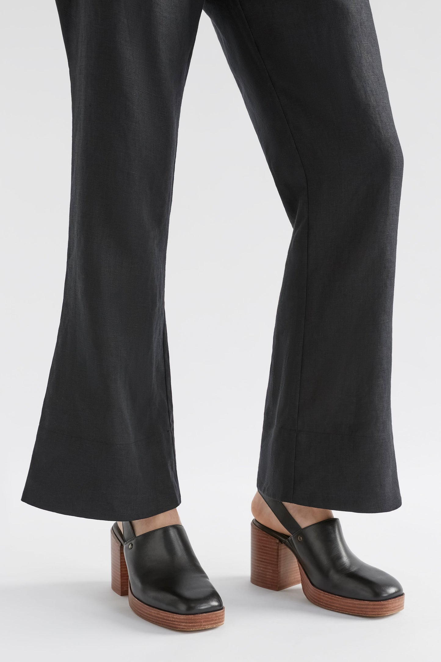 Stilla Linen Boot Cut High Rise Pant model angled front crop | BLACK