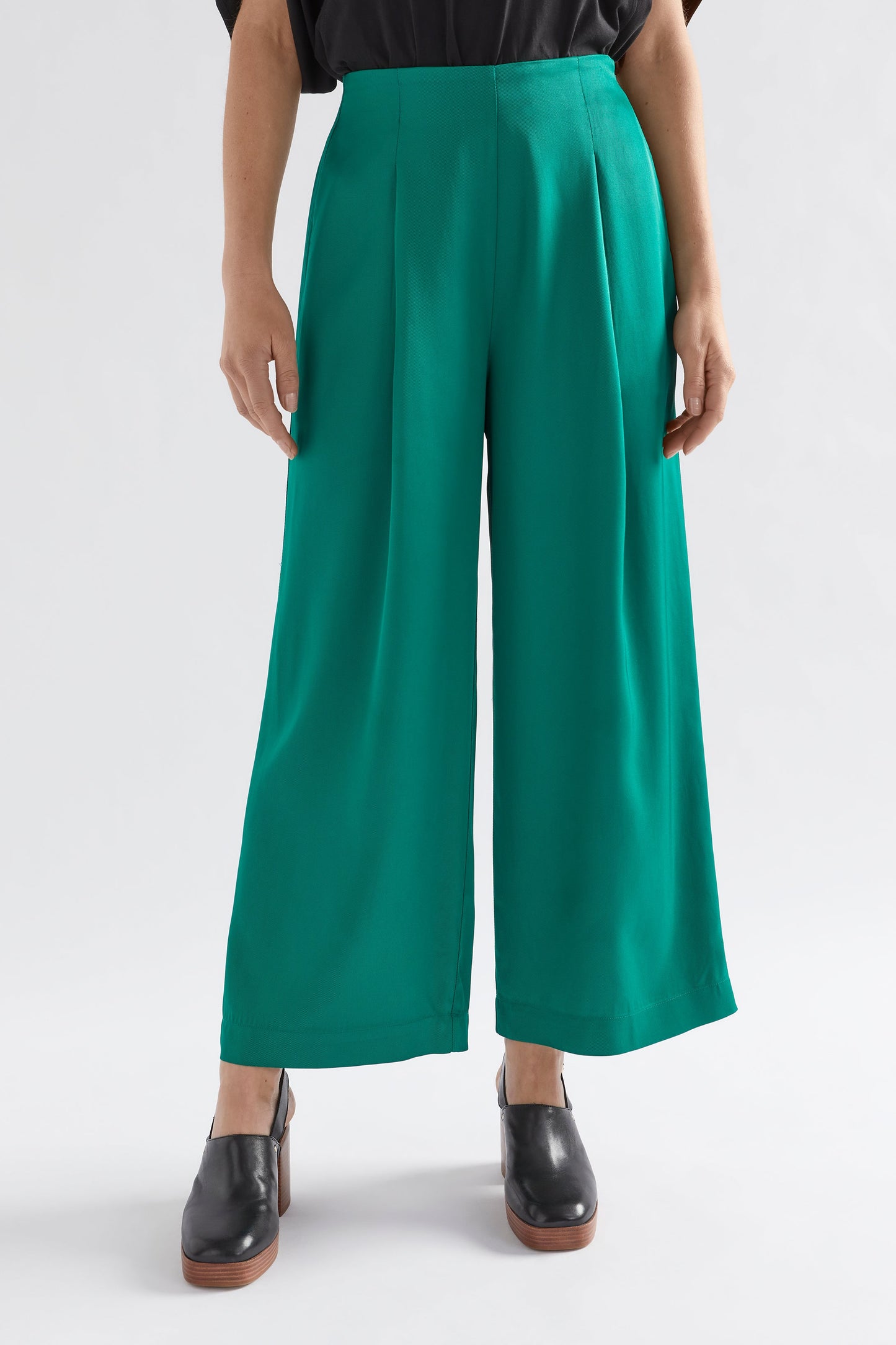 Vail High Waisted Wide Leg Pant Model Front with Black Nid Tee crop | JEWEL GREEN