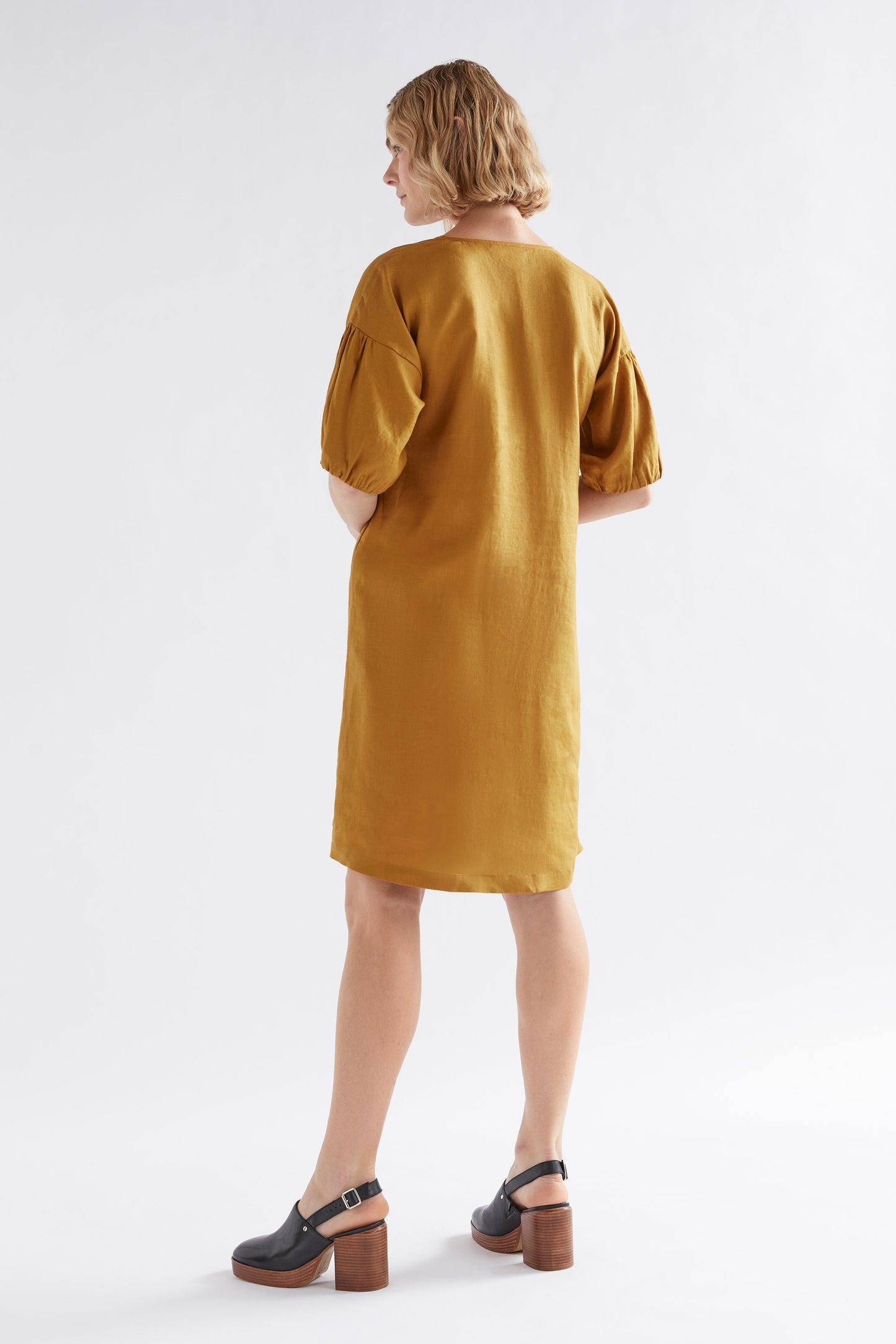 Strom Linen Puff Sleeve V-Neck Knee Length Dress Model Back | HONEY GOLD