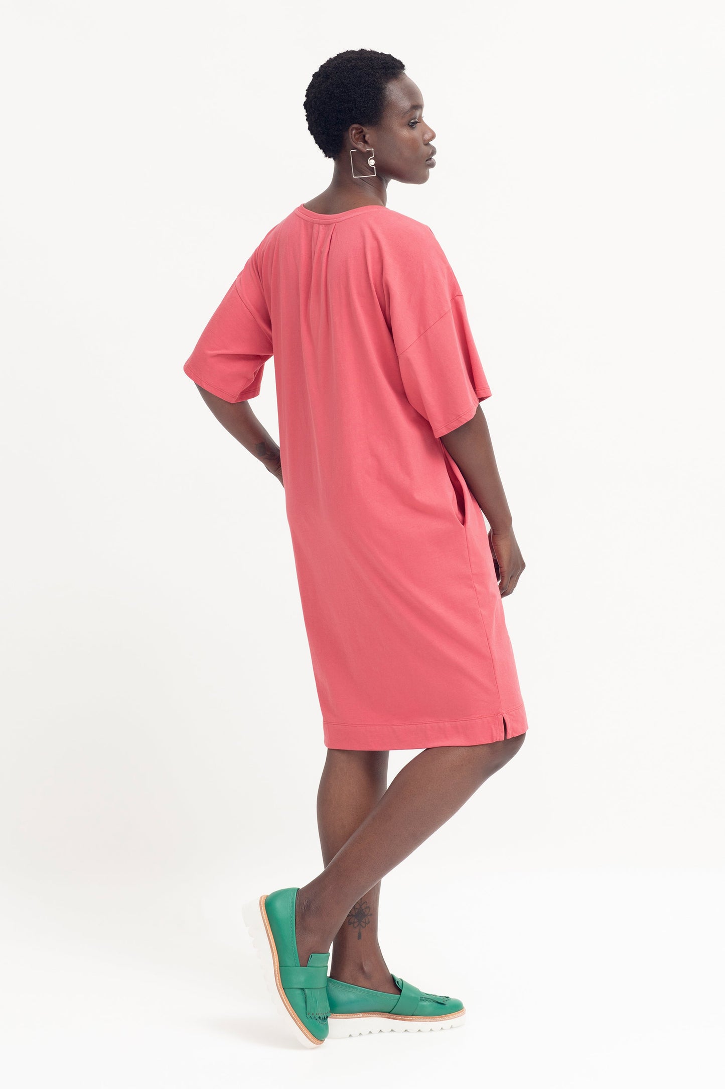 Kovaa Organic Dropped Shoulder Relaxed Tshirt Dress Model Angled Back | DESERT ROSE