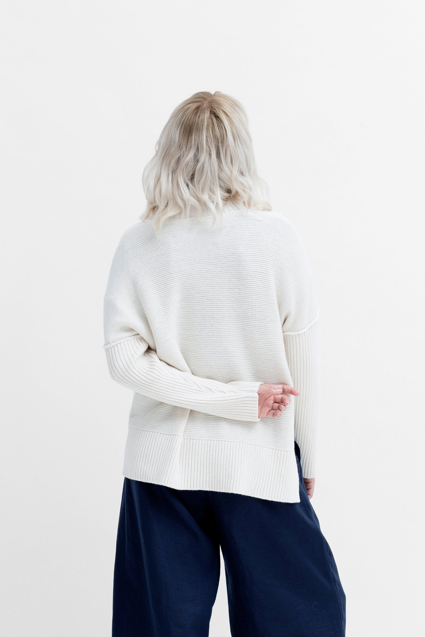 Eryka Low Turtle Neck Side Zip Detail Sweater Model Back | WHITE