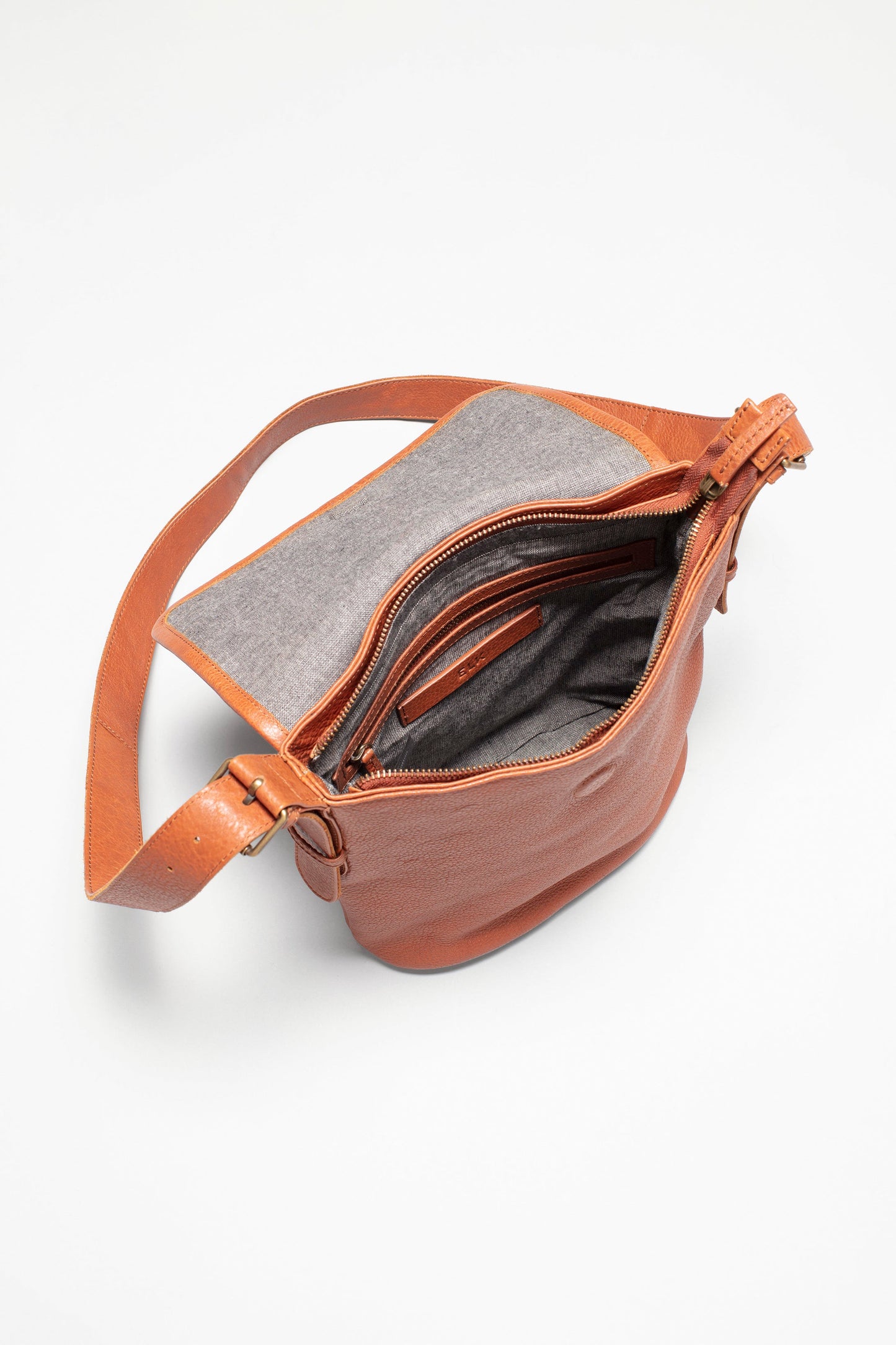 Teo Medium sized Leather Crossbody Bag with flap Internal TAN