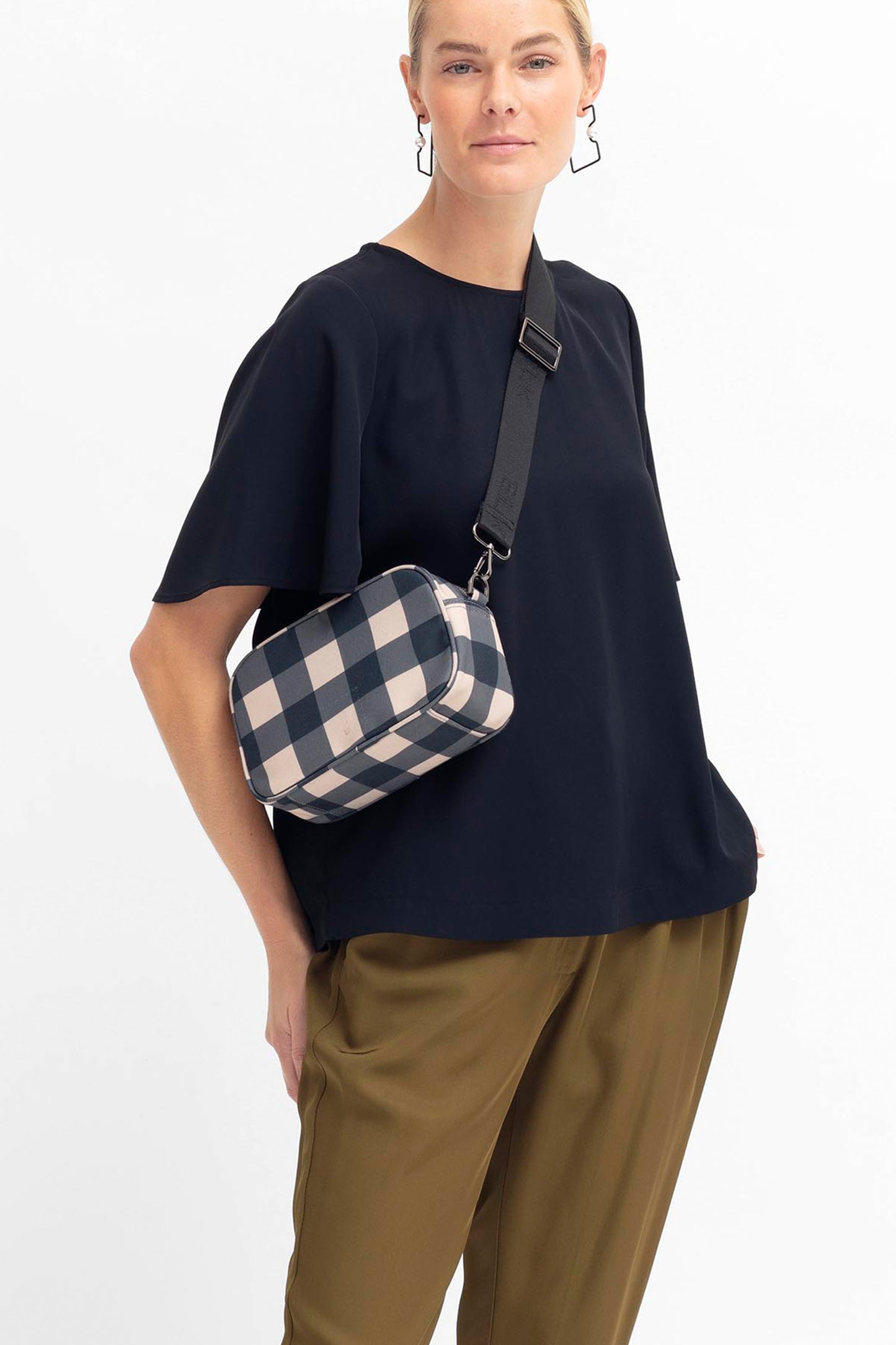 Kassel Recycled Fabric Gingham Print Zip Up Cross Body Bag Model Front | BLACK CAMEL GINGHAM