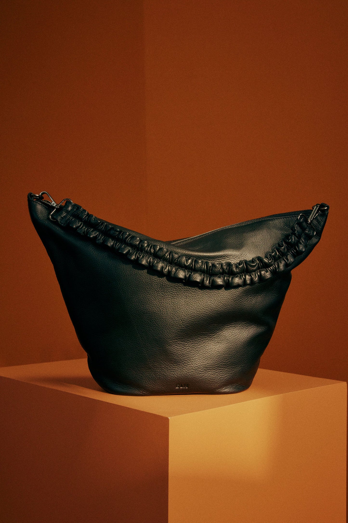 Miri Mid Size Slouch Leather Bag Campaign | BLACK